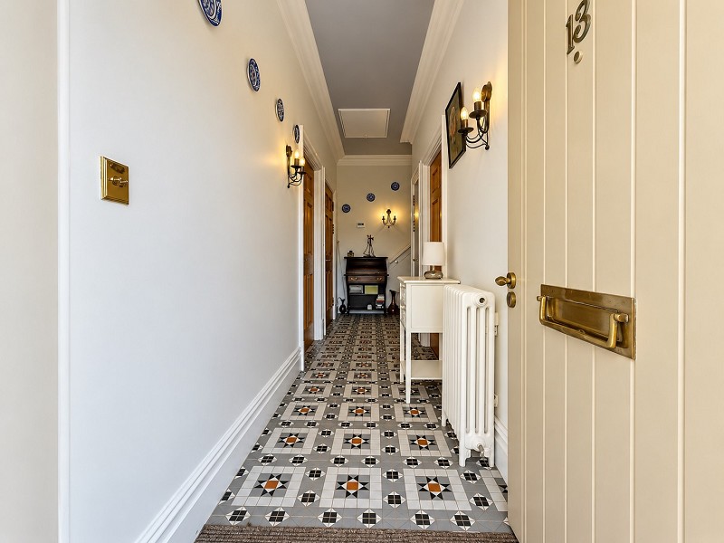 Hallway with tiled floor